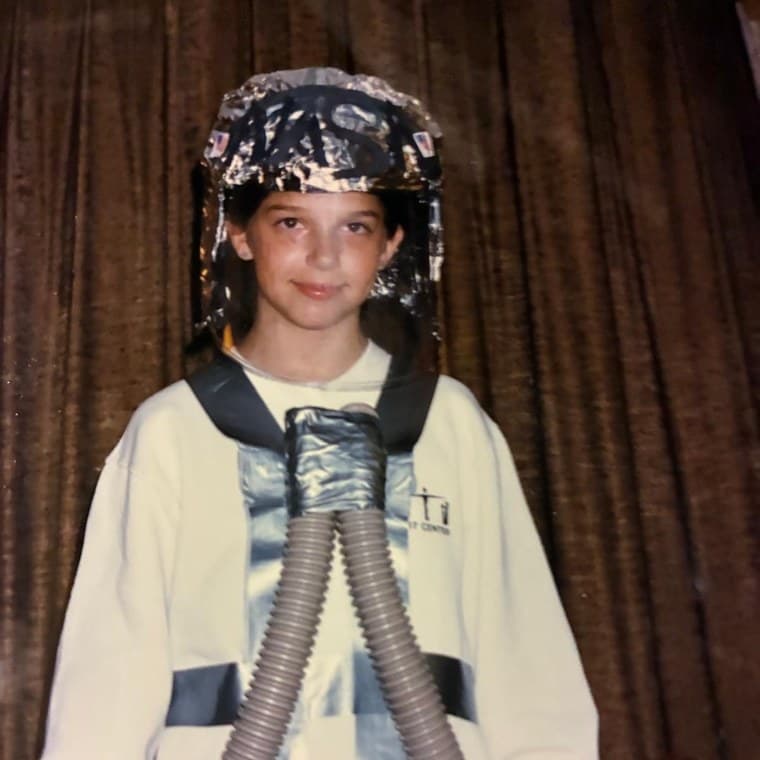 Holly as a child in a homemade astronaut costume